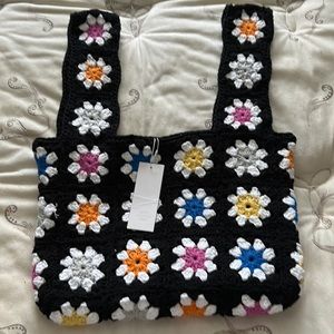 Nwt handmade Carolyn Rowan knitted bagog $315